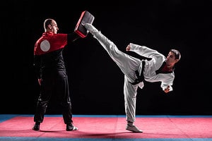 How does the philosophy and values of Taekwondo contrast with other martial arts styles? 